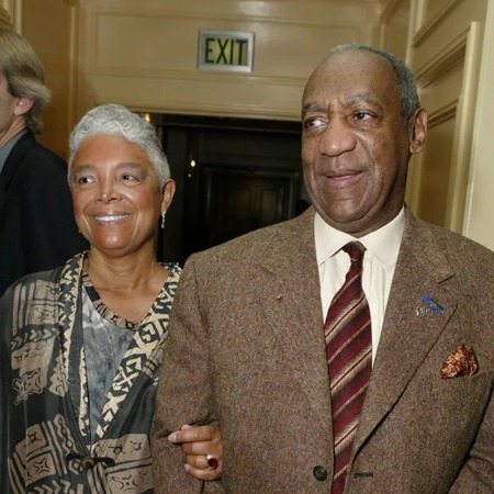 Erika Cosby's parents in formal uniform.